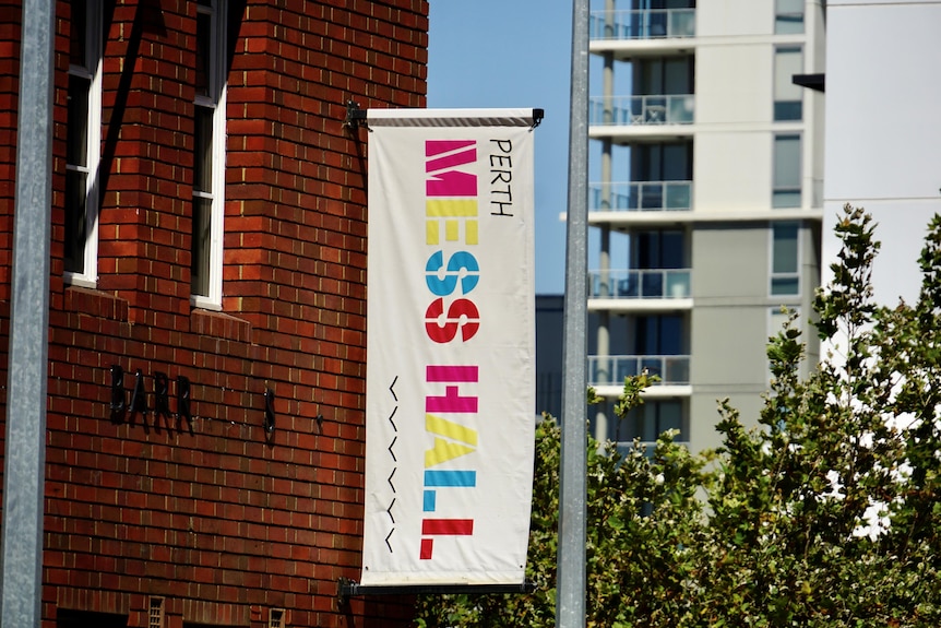 A banner outside the Perth Mess Hall.