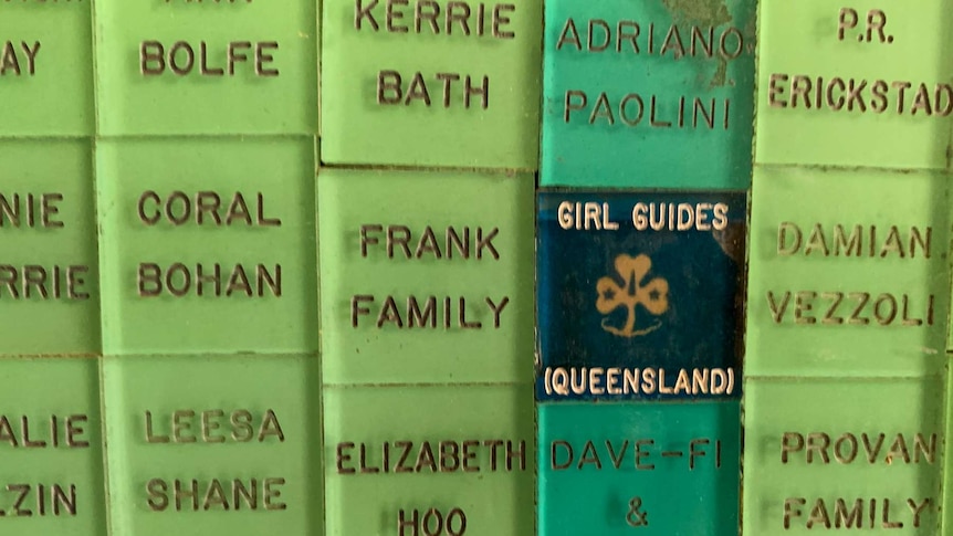 Small tiles with family name written on them.