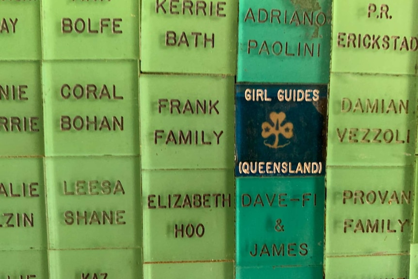 Small tiles with family name written on them.