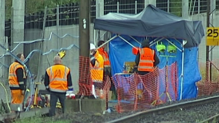Metro staff work on signalling damage at Richmond Station