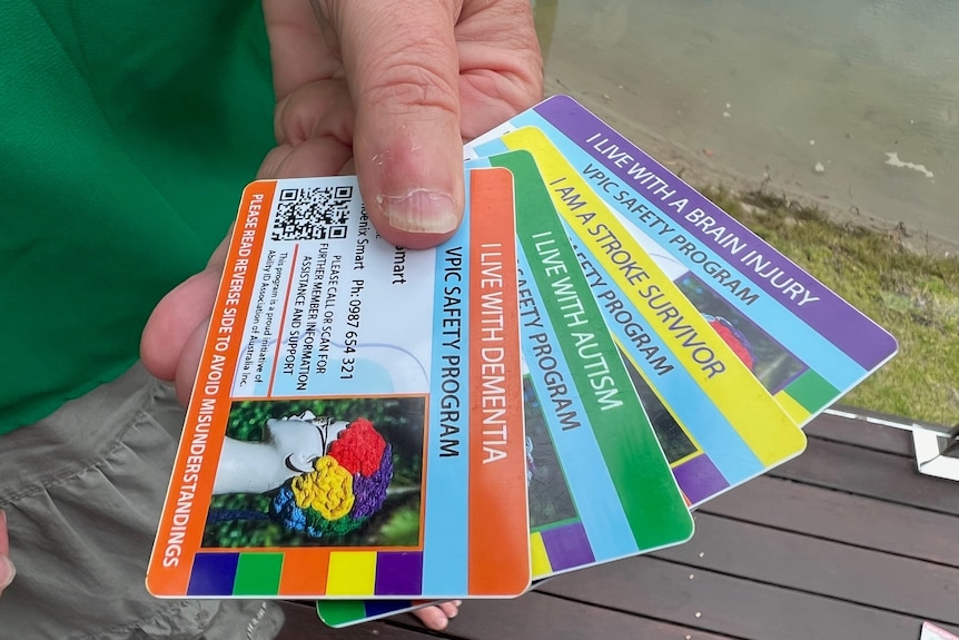 Colourful cards are displayed with information about people living with brain injuries