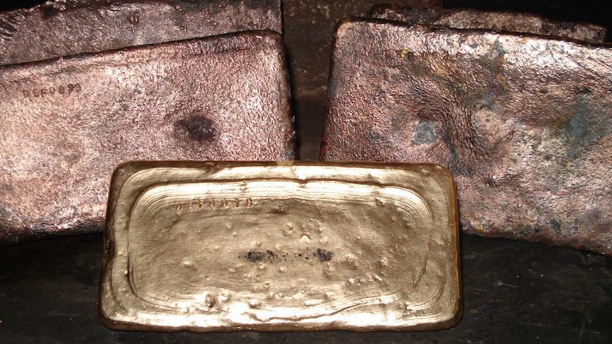 A close up shot of gravity fed gold bars