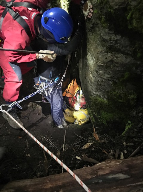 Paramedics and police rescue a woman from Mystery Creek Cave.