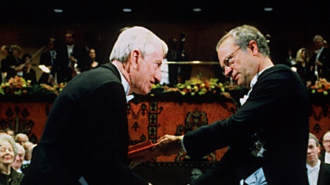 Professor Peter Doherty on stage receiving Nobel Prize in 1996.