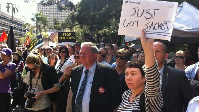 Protesters rally outside Queensland's Parliament House in Brisbane.