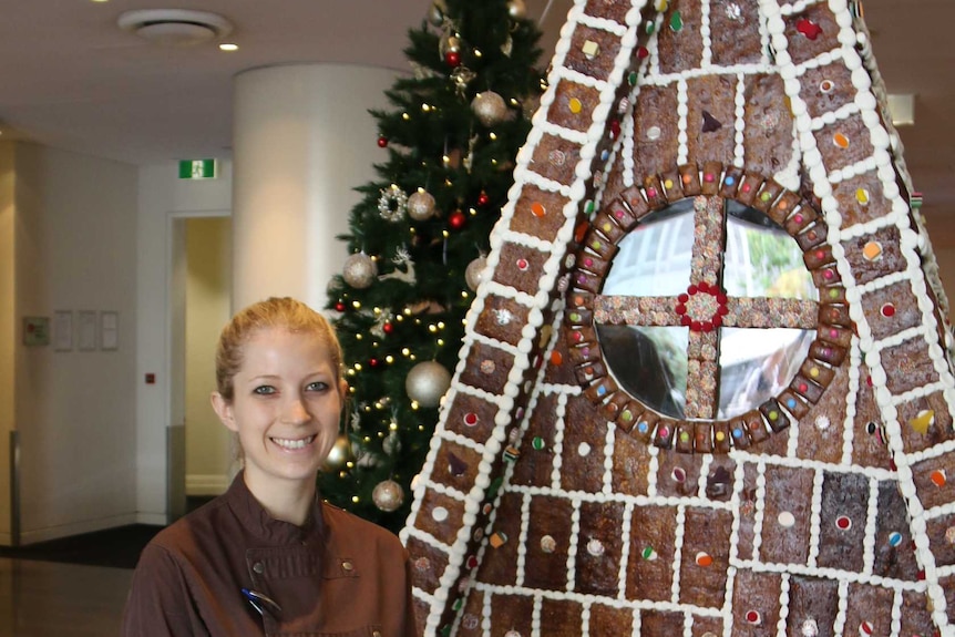 Pastry chef Tammy Cole and her creation: Queensland's biggest gingerbread house