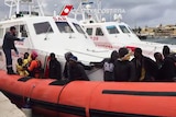 Migrants rescued by Italian coastguard