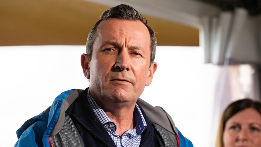 Mark McGowan with a serious expression during a media conference.