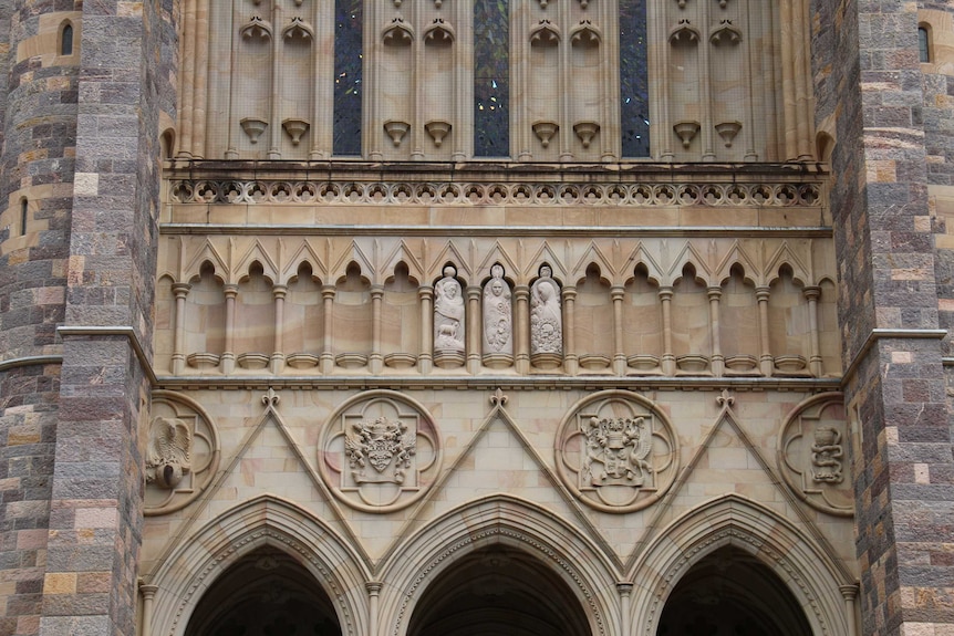 John the Baptiser, Wisdom and Mary Magdalene watch over the entrance at St John's Cathedral