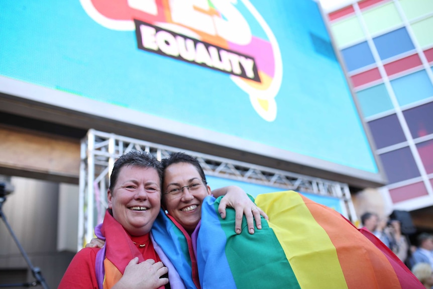 A couple hug at the Yes event in WA