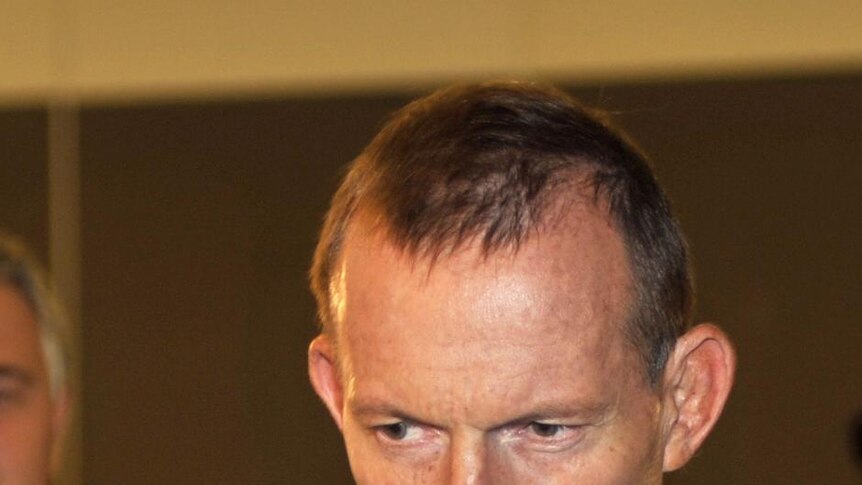 Tony Abbott and Joe Hockey arrive for a press conference