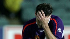 Jamie Harnwell of Perth Glory dejected after loss to Adelaide United