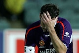 Jamie Harnwell of Perth Glory dejected after loss to Adelaide United