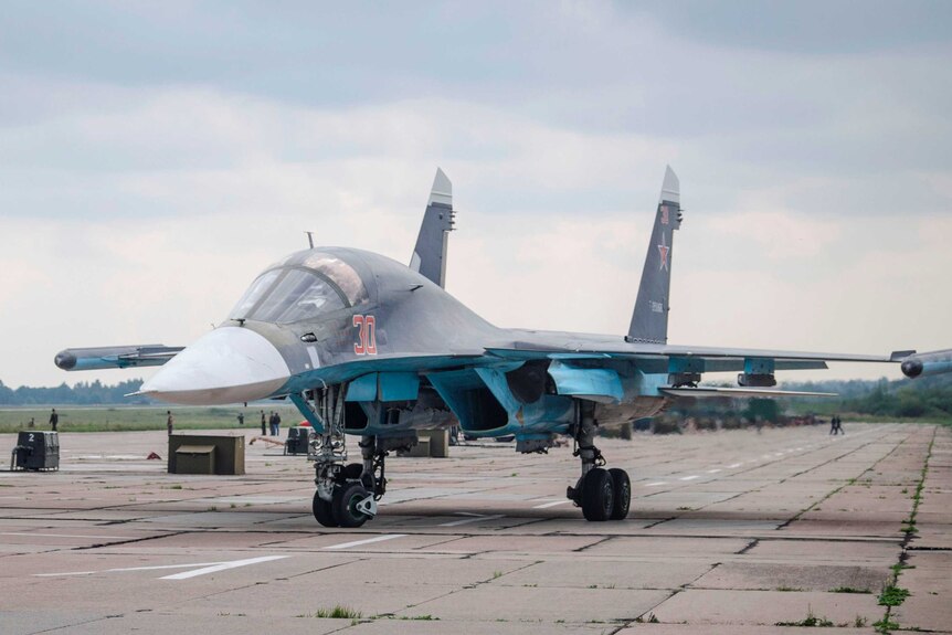 A Russian military jet is parked at an airbase at an undisclosed location in Belarus ahead of joint war games.