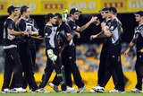 The Black Caps celebrate the dismissal of Michael Hussey