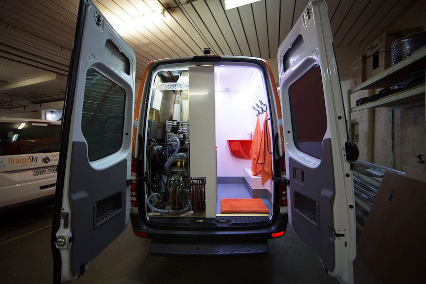 The shower and water system as seen from the rear of the van
