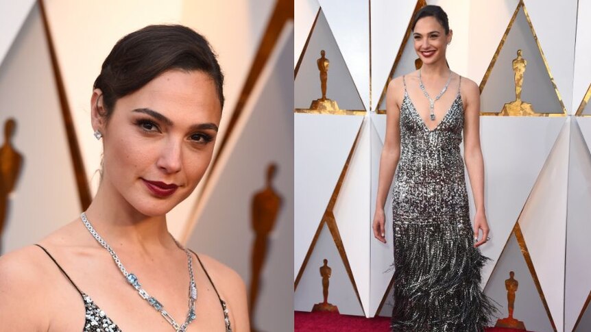 Presenter and star of Wonder Woman, Gal Gadot wore a low plunging dress adorned with metallic fringe and sequins.