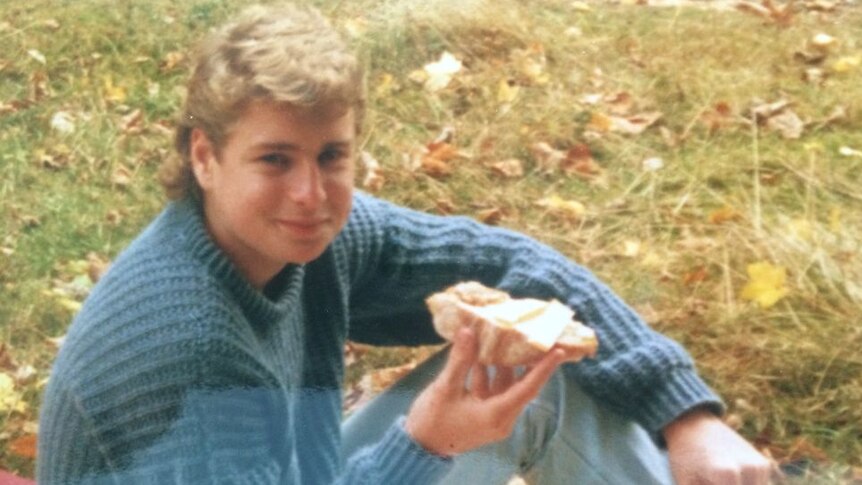 Jeremy Ball at 18 years old, at an outdoor picnic