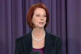Julia Gillard urged voters to choose her "positive" plan over Tony Abbott's "negative" vision.