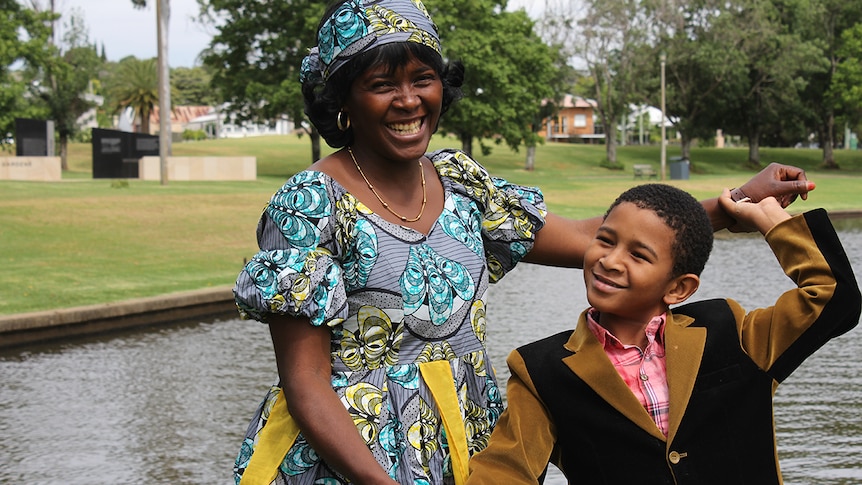 Mother and son near lake in Toowoomba park