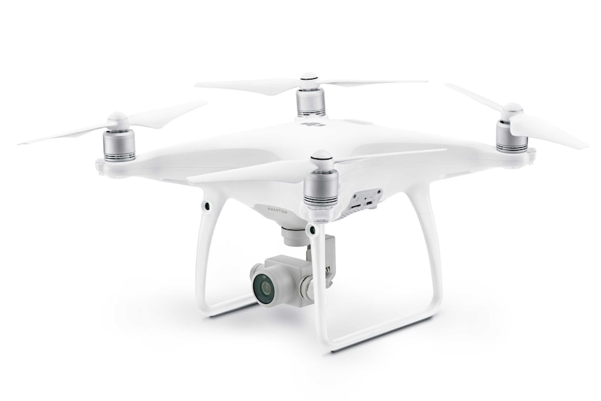 A professional marketing photograph of a white drone with four propellers against a white background.