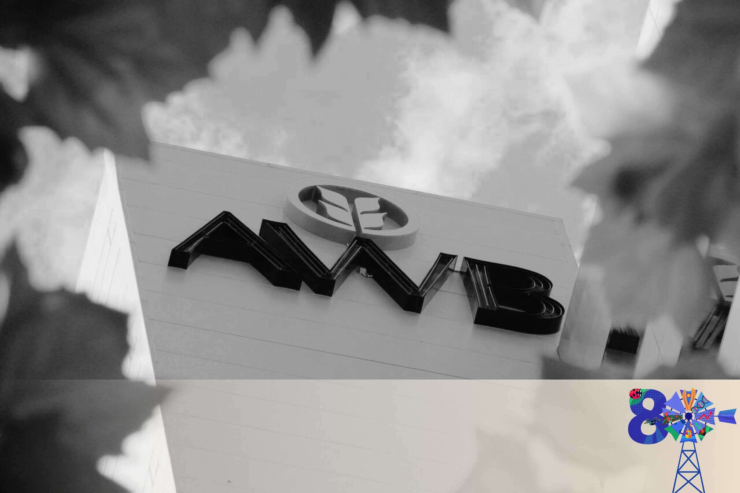 AWB logo in background, looking through some trees 