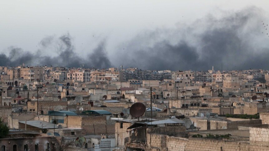 Smoke rises after airstrikes on the rebel-held al-Sakhour neighbourhood of Aleppo.
