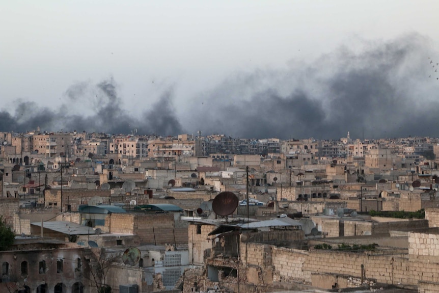 Smoke rises after airstrikes on the rebel-held al-Sakhour neighbourhood of Aleppo.