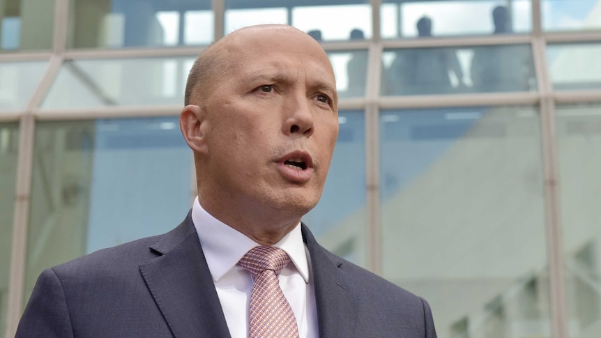 Peter Dutton speaks outside Federal Parliament