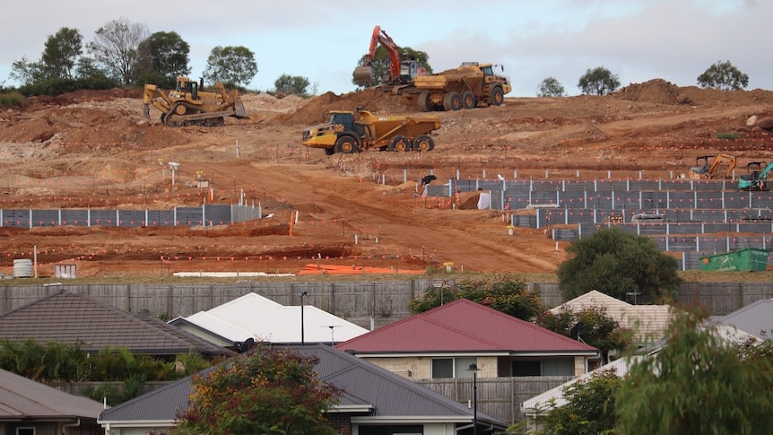 Homes being built in Ripley Valley with roofes of built homes in the foreground