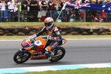 Australia's Jack Miller celebrates winning the Moto3 race at the Australian MotoGP.