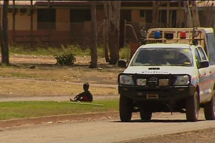 Police car and child at Halls Creek