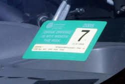 A Queensland car registration label.