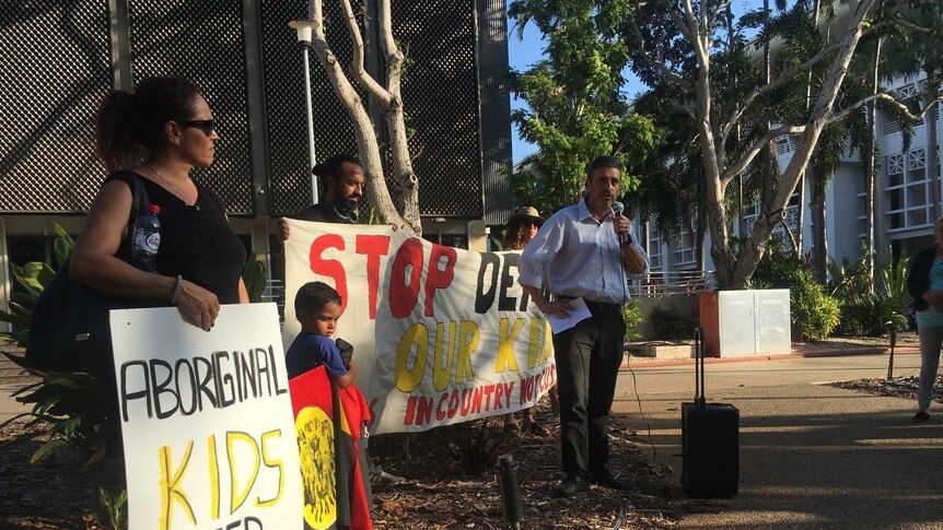 Jared Sharp speaks at a protest in Darwin on November 16, 2018.