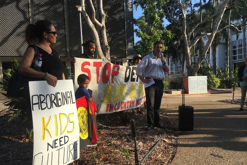 Jared Sharp speaks at a protest in Darwin on November 16, 2018.