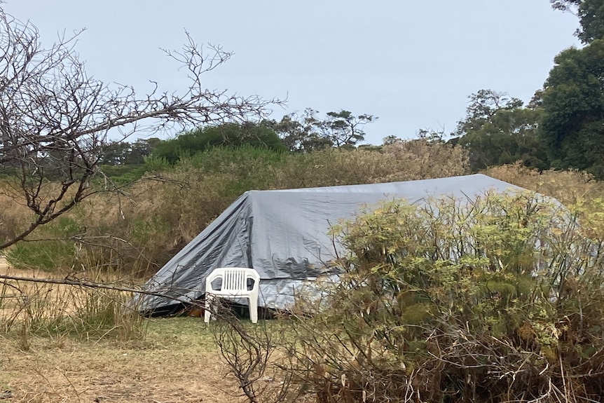 A grey tent erected in bushland near Margaret River.