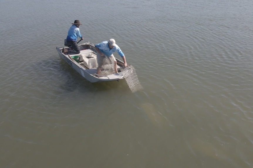 Two men in a boat 