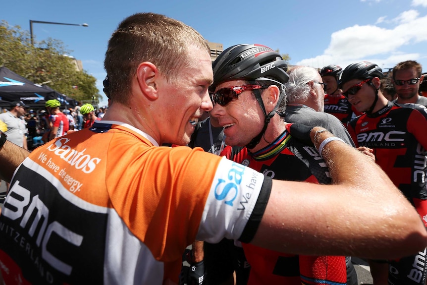 Evans embraces Dennis after TDU triumph