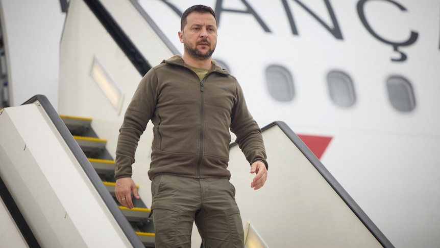 Ukraine's President Volodymyr Zelenskyy disembarks French government plane.