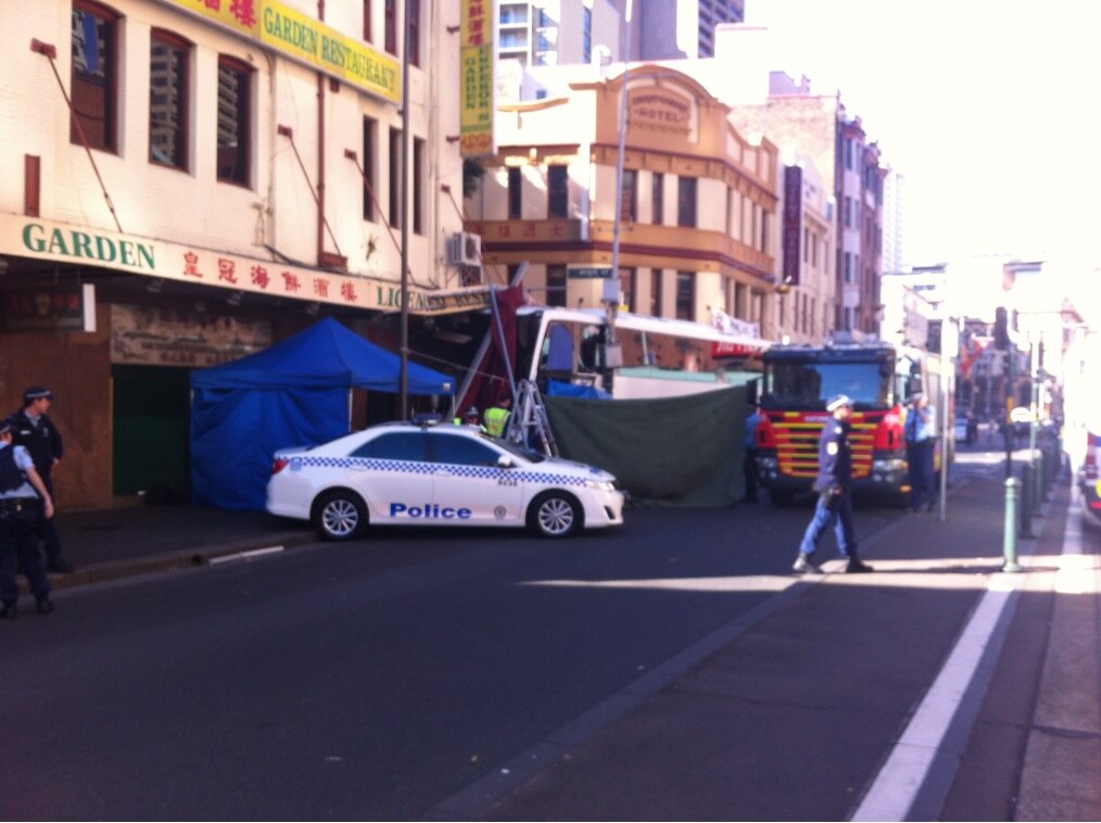 Man dies after being pinned under bus that crashed into Haymarket
