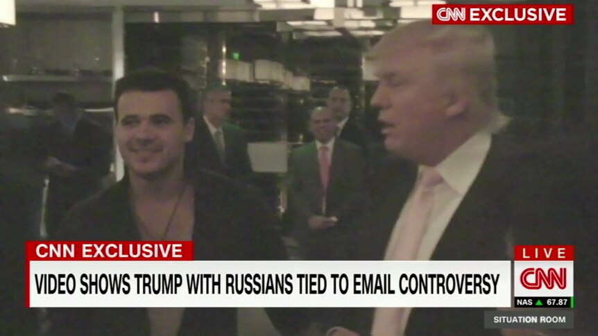 Vision obtained by CNN shows Donald Trump socialising with Russians tied to email controversy