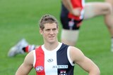 Back tightness ... Nick Dal Santo stretches at training