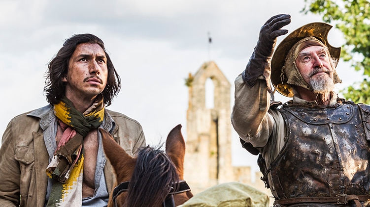 Colour still of Adam Driver and Jonathan Pryce sitting on horses in 2018 film The Man Who Killed Don Quixote.