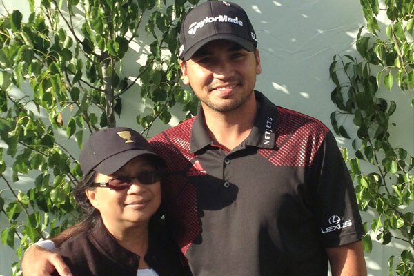 Dening Day standing with her son Jason Day in Melbourne in 2013.