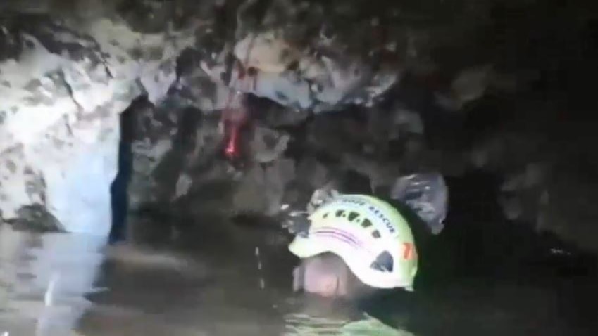 A man inside the Thai cave where 12 boys and their football coach are trapped.