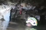 A man inside the Thai cave where 12 boys and their football coach are trapped.