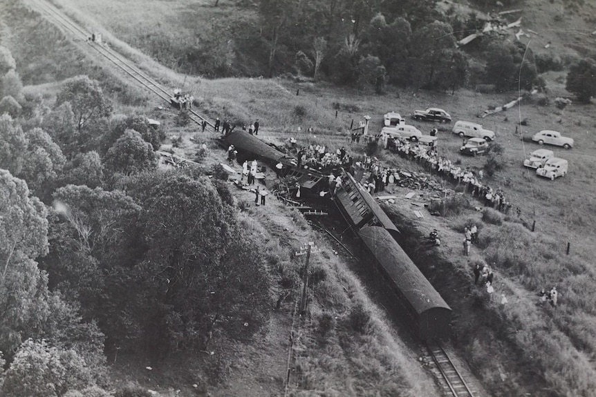 Wreckage of train that crashed at speed on a bend at Camp Mountain in 1947.