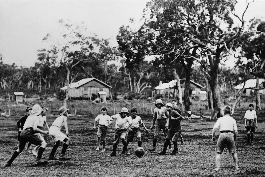 Australian children playing football in 1933