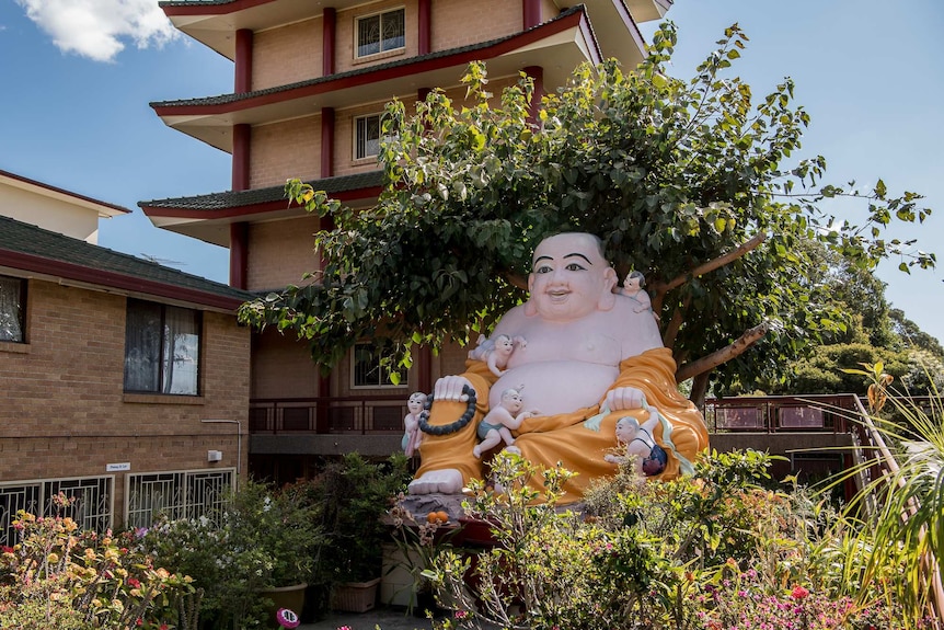 A statue of Budda sits outside a Buddhist Temple in Wetherill Park NSW. Photo taken on October 1 2019