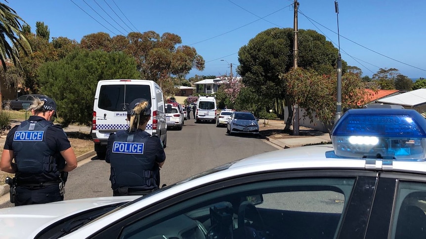 A strong police presence in a suburban Adelaide street.